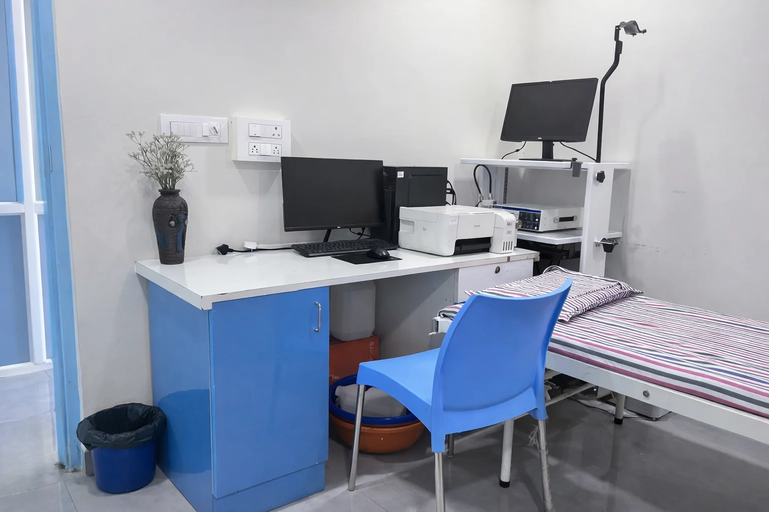 hospital in Koppa – medical staff assisting patient